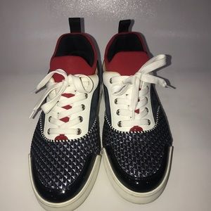 Red bottom sneakers